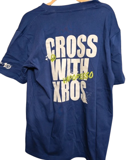 Blue t-shirt with white and green text on a white background