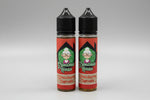 Load image into Gallery viewer, Two bottles of 'Grandma's House' Strawberry Cupcake-flavored e-liquid on a stone surface.