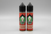 Two bottles of 'Grandma's House' Strawberry Cupcake-flavored e-liquid on a stone surface.